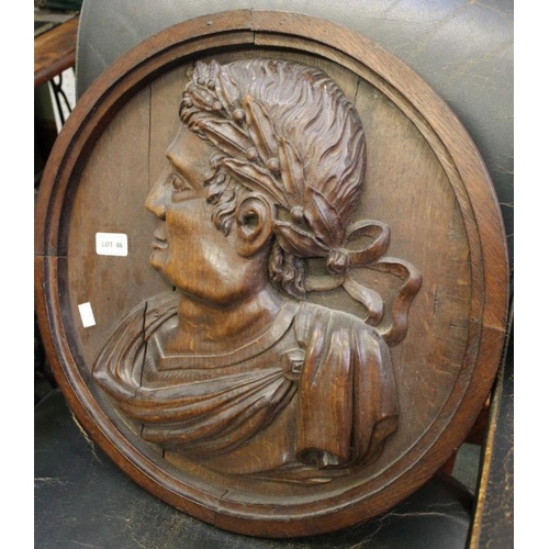 66 - An oak roundel with profile of Roman Emperor
