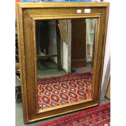 90 - A rectangular gilt framed mirror.
