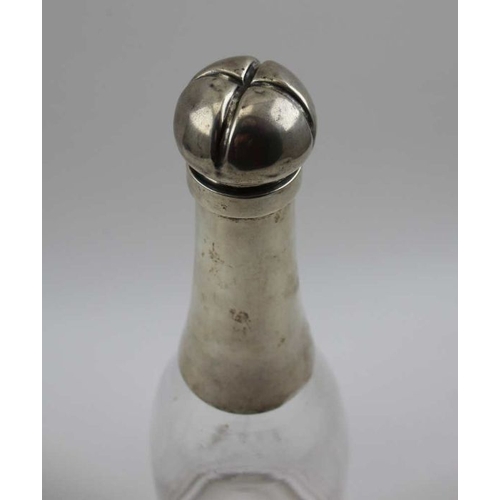 1 - Hukin & Heath, a late Victorian silver mounted Champagne bottle form decanter, Birmingham 1892, 32cm... 