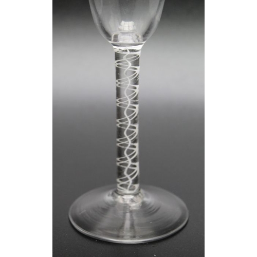 101 - An 18th century single series opaque twist glass circa 1765, 16cm high