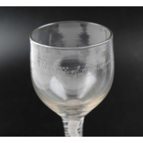 103 - An 18th century wine glass, cotton twist stem and conical foot, the bowl engraved 