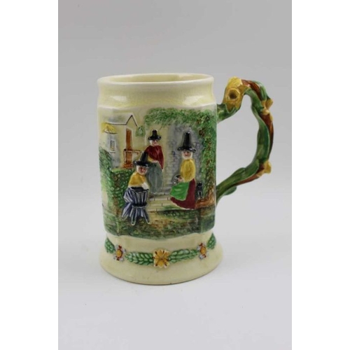 111 - A Crown Devon pottery musical tankard, hand painted decoration, with Welsh ladies, Prince of Wales c... 