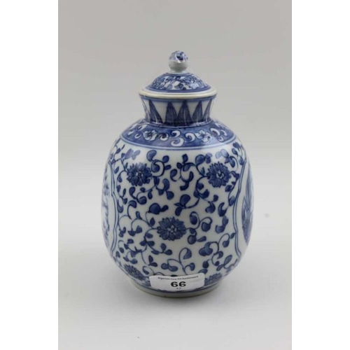 113 - A Chinese porcelain vase with cover, cobalt blue underglaze painting, panels of birds with scrolling... 