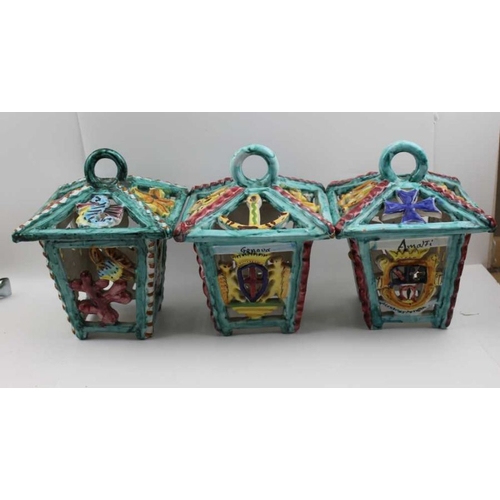 127 - Three Italian Faience lanterns, two moulded and painted with the arms of Italian cities, including V... 