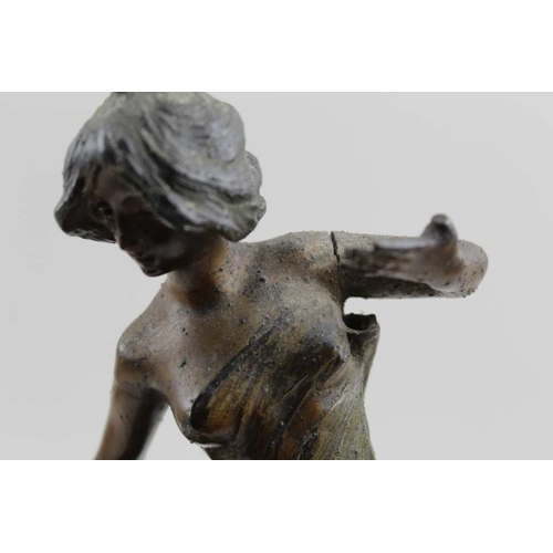 131 - A French spelter Art Nouveau figure, modelled as a girl beside a poppy, c.1900