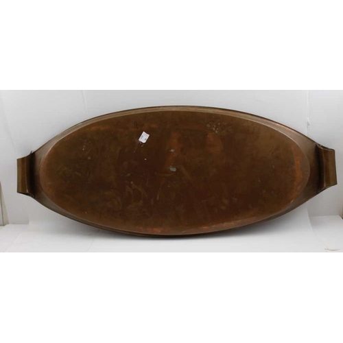 134 - WAS Benson, an arts & crafts copper oval tray, c.1900, with twin curled handles, 74cm wide, stamped,... 