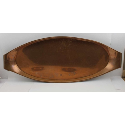 134 - WAS Benson, an arts & crafts copper oval tray, c.1900, with twin curled handles, 74cm wide, stamped,... 