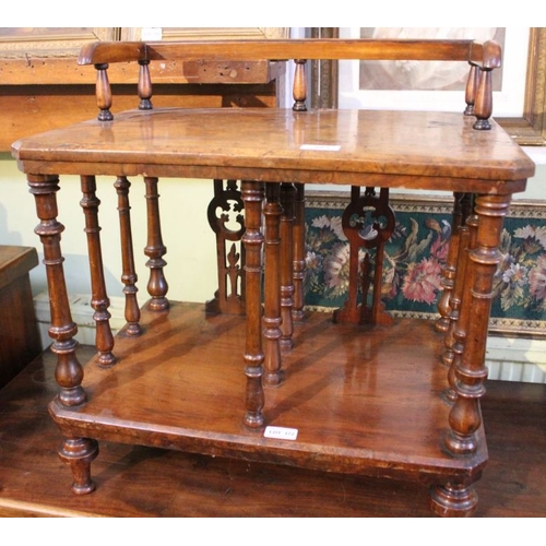 172 - A Victorian unusual design walnut topped Canterbury. 48 cm high excluding gallery.