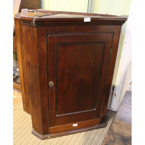 188 - A Georgian mahogany plain hanging corner cupboard. 91 cm high.