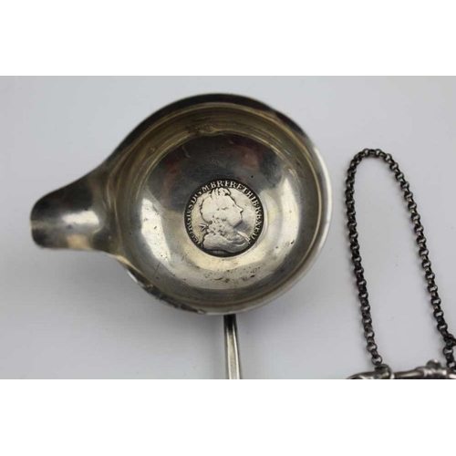 28 - A George III silver caddy spoon, bright cut decoration to the handle, plain bowl, London 1800, toget... 