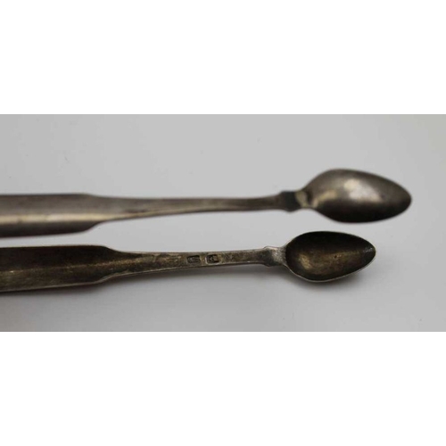 29 - Richard Sawyer, a George III pair of silver sugar tongs, Dublin 1817, a pair of late 18th century su... 