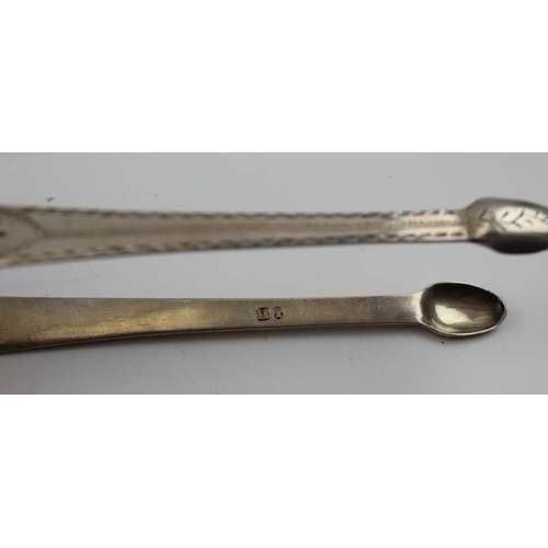 29 - Richard Sawyer, a George III pair of silver sugar tongs, Dublin 1817, a pair of late 18th century su... 