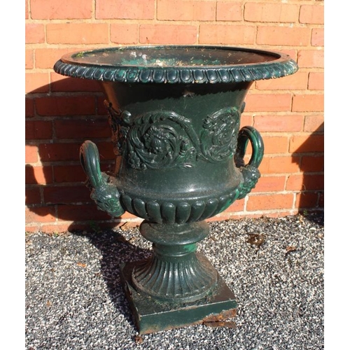 304 - A pair of early 19th century Regency cast iron garden planters, fluted urn form with egg & dart rims