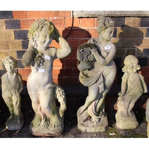 312 - Four various cast concrete garden statues.