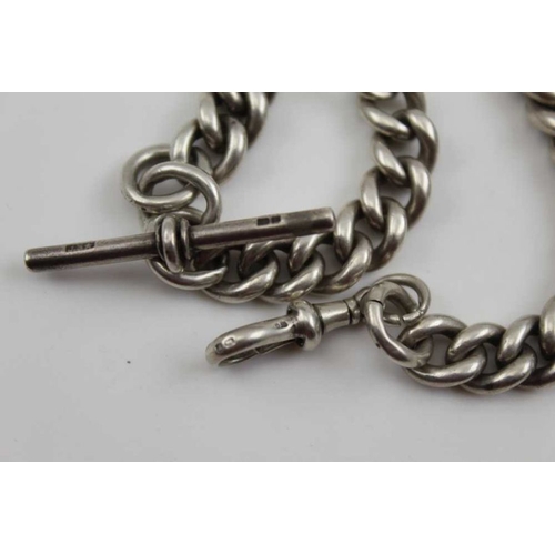 33 - A substantial silver watch chain, graduated links, with 