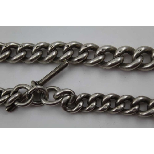 33 - A substantial silver watch chain, graduated links, with 