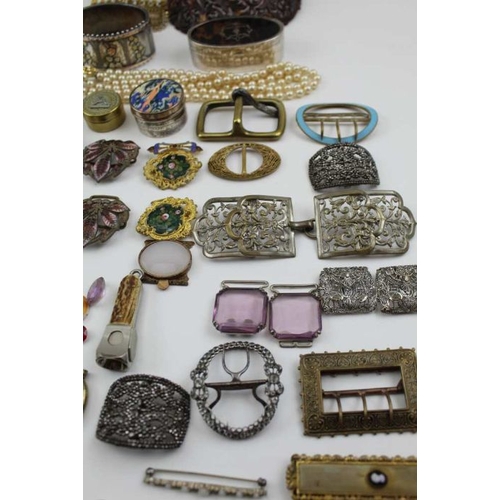 34 - A collection of decorative buckles and costume jewellery, includes a pair of bright cut steel shoe b... 