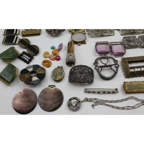 34 - A collection of decorative buckles and costume jewellery, includes a pair of bright cut steel shoe b... 