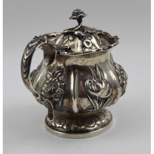 37 - William Bateman II, a William IV silver lidded mustard pot, lobed hexagonal form with repousse flora... 