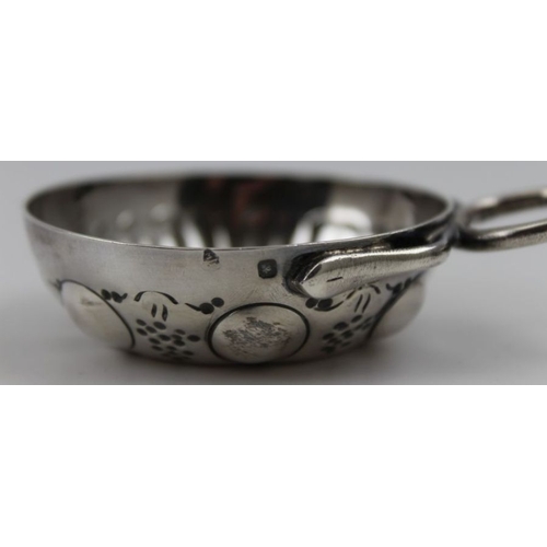 38 - A late 19th century French silver taste de vin, embossed fruiting vine decoration, engraved 