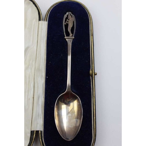 42 - An early 20th century silver spoon the handle terminal pierced and engraved with an image of the Pie... 