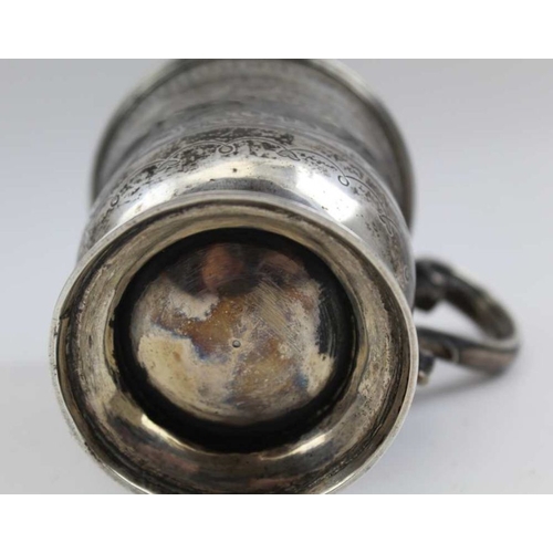 5 - James McKay, a mid 19th century silver Christening mug, scroll handle, engraved anthemion decoration... 