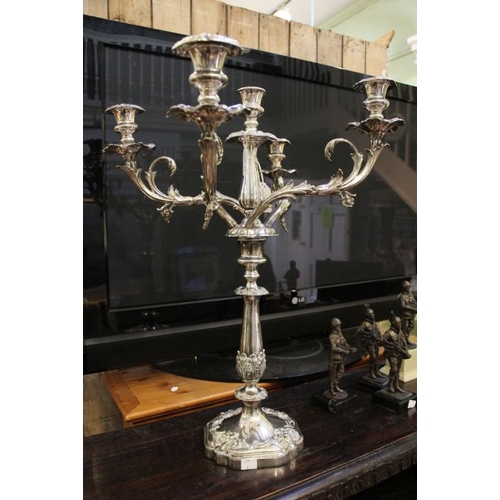 51 - A silver plated five light candelabra, 55cm high