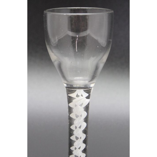 85 - An 18th century opaque twist cordial glass circa 1765, 12.5cm high