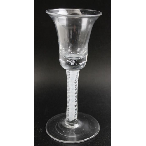 92 - A possibly Dutch wine glass, with bell shaped bowl, cotton twist stem, on circular platform foot, 16... 