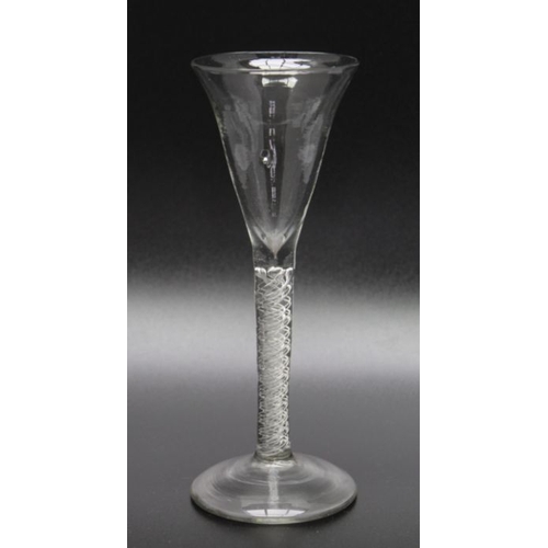 80 - An ale glass with trumpet bowl,  spiral air twist stem, and domed foot, 18.5cm high