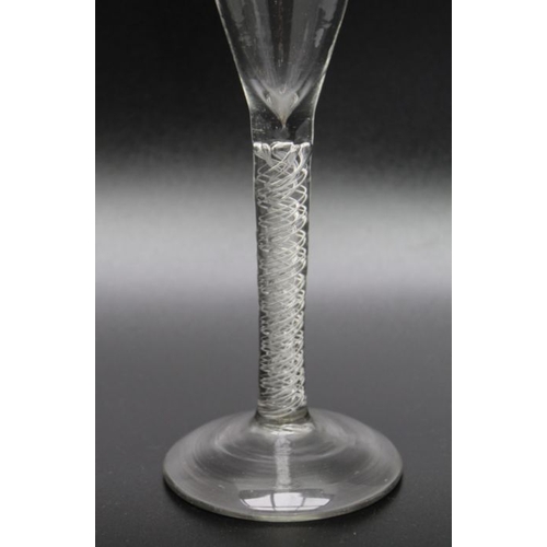 80 - An ale glass with trumpet bowl,  spiral air twist stem, and domed foot, 18.5cm high