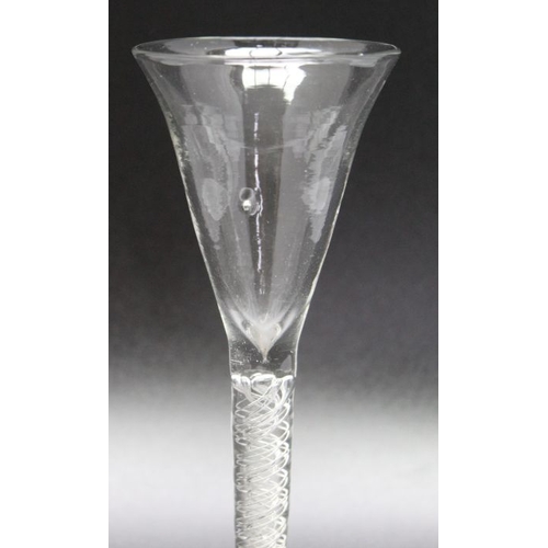 80 - An ale glass with trumpet bowl,  spiral air twist stem, and domed foot, 18.5cm high