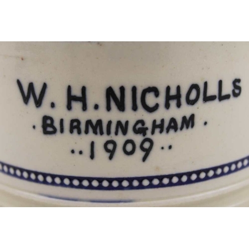 126 - A Chemists stoneware drug jar with cover, inscribed W.H. Nicholls, Birmingham 1909