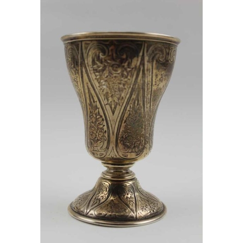 13 - A Victorian silver goblet, engraved floral decoration (hallmarks worn) 11cm high, 123g