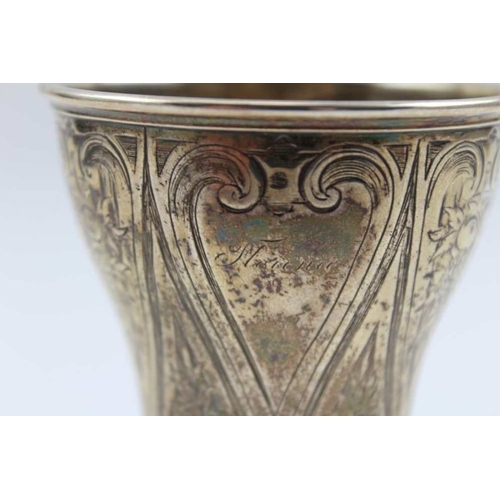 13 - A Victorian silver goblet, engraved floral decoration (hallmarks worn) 11cm high, 123g