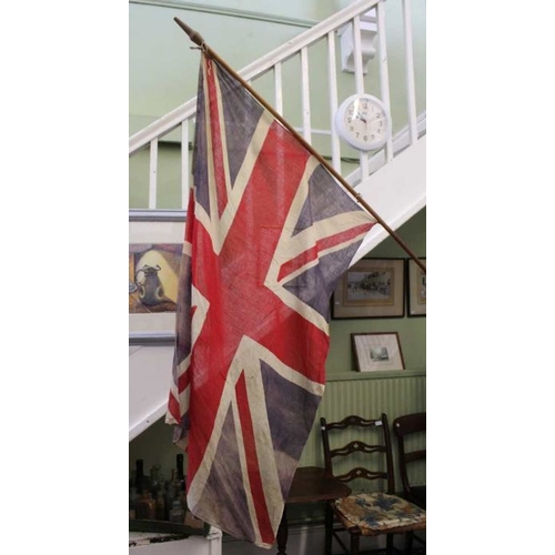 140 - An old Union Jack with flag staff