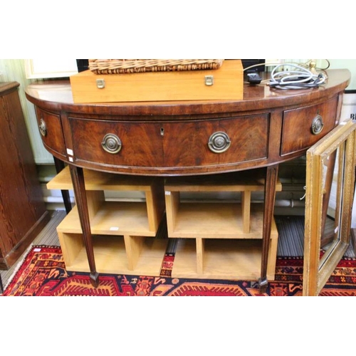 145 - A 19th century flamed mahogany D shape serving table, having three inline drawers, 92cm x 162cm