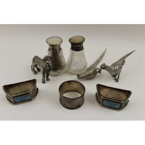 18 - A pair of silver mounted condiments, two plated Masonic napkin rings, a pair of silver plated pheasa... 