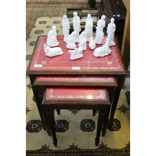 201 - A nest of three tables on square reeded legs with spade feet