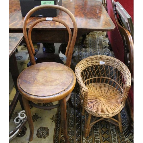 209 - A woven wicker child's tub chair with a bentwood cafe chair with later seat