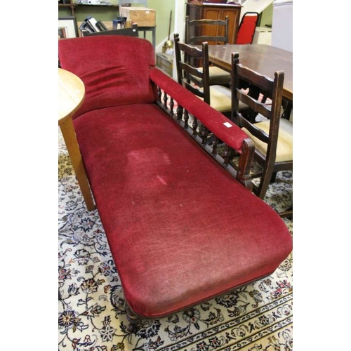 220 - An Edwardian show-wood framed spindle backed chaise longue