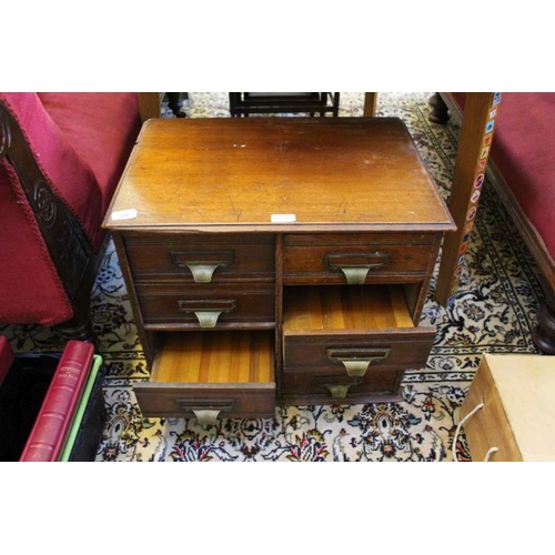 230 - An Edwardian mahogany table top eight drawer filing cabinet