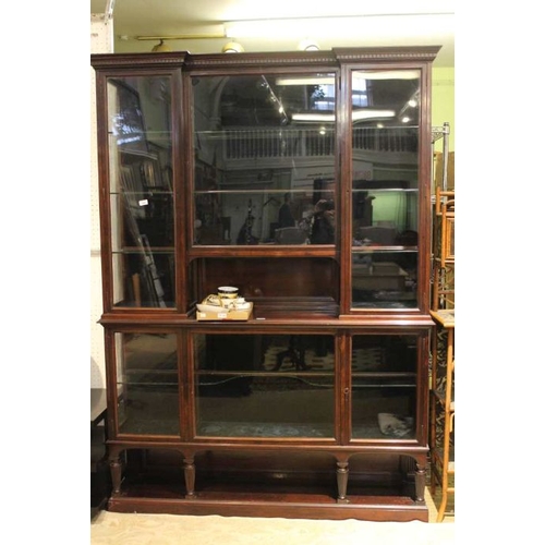 265 - First quarter 20th century quality mahogany and glass display cabinet, with dentil cornice over brea... 