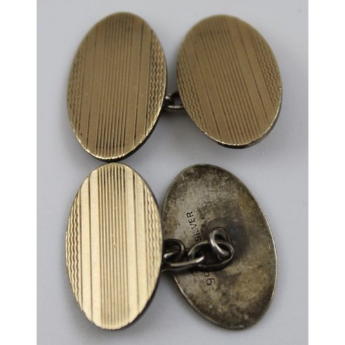 29 - Two pairs of cufflinks, both of chain link design, with engine turned faces, one pair 9ct gold, 3g, ... 