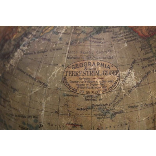 290 - An early 20th century 8 inch terrestrial globe by Geographica Ltd of London on turned wooden baluste... 