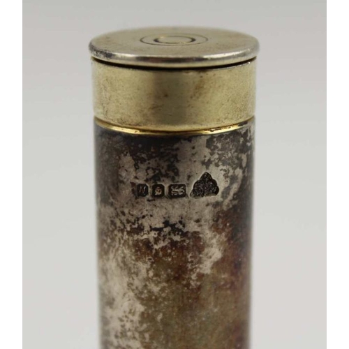 4 - A silver and silver gilt cannister, formed as a 12-bore cartridge, London 1987, 5.5cm long, 42g