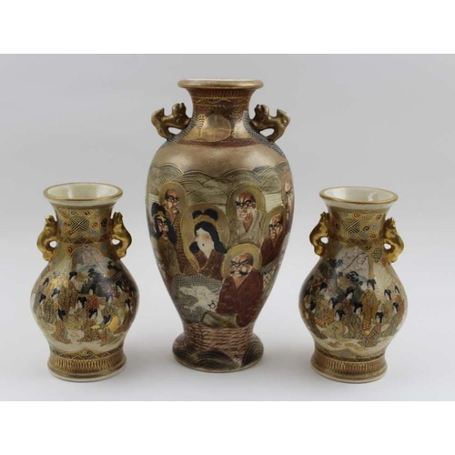 43 - A pair of Japanese Satsuma ceramic vases, of baluster form, having gilded handles, painted with figu... 