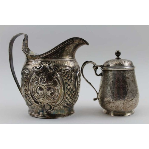 5 - Alexander Field, a George III silver milk jug, floral embossed decoration, engraved crest London 179... 