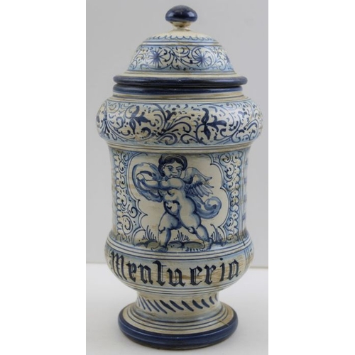 58 - A Deruta majolica dry drug jar, blue painted with putti decoration, inscribed (Mentueria), 30cm high