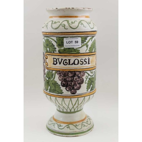 59 - A majolica drug jar, painted with fruiting vine in the round, inscribed Bvglossi, 29.5cm high